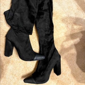 Never Worn. Heeled boots.